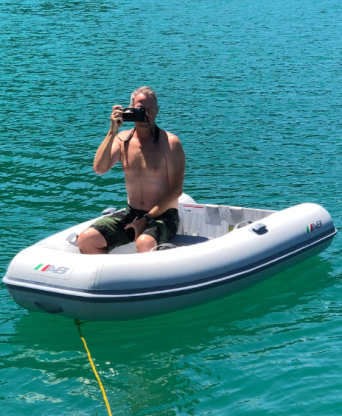 Pete taking photos from the dinghy